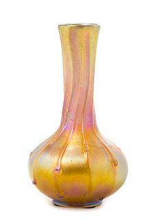* A Tiffany Studios Gold Favrile Glass Vase, Height 8 3/4 inches.