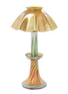 * A Tiffany Studios Gold Favrile Glass Candlestick, Height overall 12 inches.