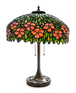 * An American Leaded Glass Lamp, Diameter of shade 18 x height overall 23 inches.
