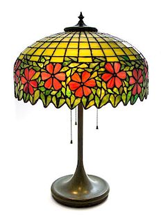 * An American Leaded Glass Table Lamp, Diameter of shade 16 x height overall 22 3/4 inches.