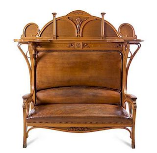 * An Art Nouveau Oak Hall Bench, Height 57 3/4 x width 80 1/2 x depth 26 1/2 inches.