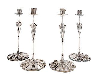 * A Set of Four French Art Nouveau Silver-Plate Candlesticks, Height 11 1/2 inches.