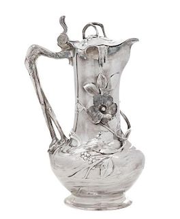 * A German Silver-Plate Water Pitcher, Height 14 1/4 inches.