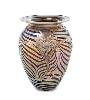 * A Silver Overlay Iridescent Glass Vase, Height 6 inches.