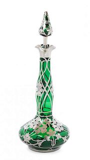 * An American Art Nouveau Silver Overlay Glass Decanter, Height 6 1/4 inches.