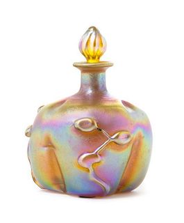 * An Iridescent Gold Glass Bottle, Height 5 1/8 inches.