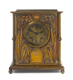 * An American Art Nouveau Mantle Clock, Height 12 1/2 inches.