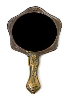 * An Art Nouveau Copper Clad Hand Mirror, Height 10 1/8 inches.