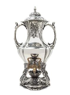 * An American Art Nouveau Silver-Plate Hot Water Kettle on Stand, Height 16 1/2 inches.