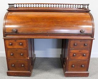 19 Century English Mahogany Barrel Top Desk.