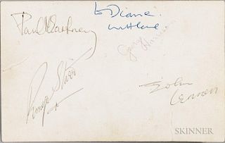 Beatles Signed Card, Early 1960s. Postcard with a black-and-white image of the musicians on recto, with printed signatures in