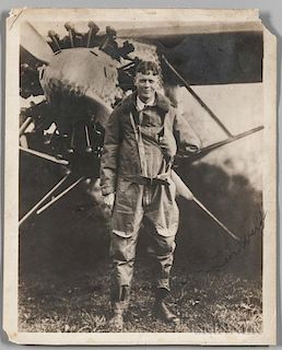 Lindbergh, Charles (1902-1974) Signed Photograph. Period 8 x 10 in. black-and-white photograph of a smiling Lindbergh in his