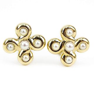 Chanel Classic Pearl and 18 Karat Yellow Gold Earrings.