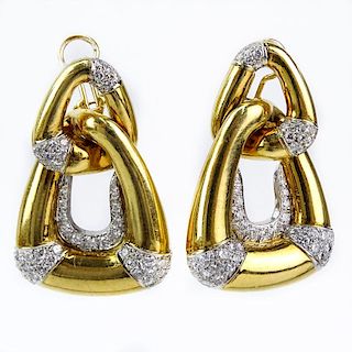 Vintage Approx. 5.0 Carat Round Brilliant Cut Diamond and Heavy 18 Karat Yellow and White Gold Earrings.