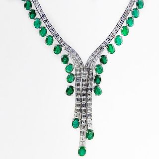 Contemporary Approx. 33.34 Carat Oval Cut Emerald, 14.02 Carat Baguette and Round Brilliant Cut Diamond and 18 Karat White Go