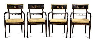 A Set of Four Regency Black Painted Armchairs Height 33 inches.