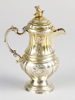 A small German Rococo silver coffee or chocolate pot