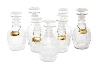 Seven English Cut Glass Decanters Height of tallest 9 1/2 inches.