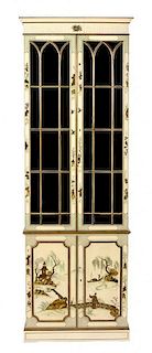 A Regency Style Cream Painted Chinoiserie Bookcase Height 85 1/4 x width 28 x depth 13 inches.