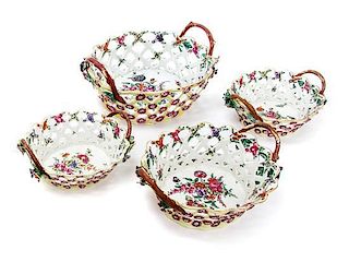 A Set of Four Derby Porcelain Baskets Largest height 4 x width 9 7/8 x depth 8 1/4 inches.