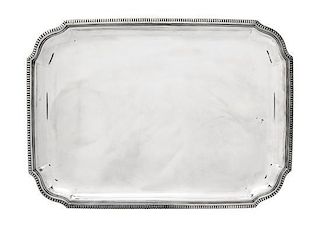 A Continental Silver Tray, Probably German, rectangular, with shaped corners and gadrooned border