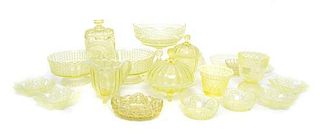 A Collection of Nineteen Vaseline Glass Articles Height of tallest 8 1/2 inches.