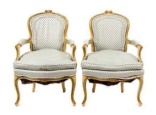 A Pair of Louis XV Style Painted and Parcel Gilt Fauteuils Height 35 inches.