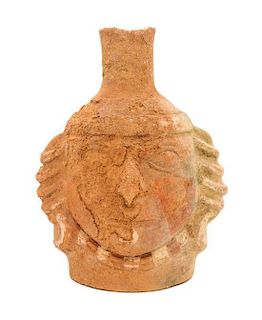 A Pre-Columbian Style Pottery Vessel Height 7 5/8 inches.