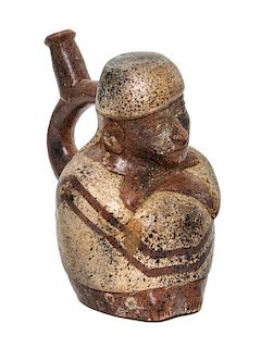 A Pre-Columbian Style Figural Stirrup Vessel Height 6 1/2 inches.