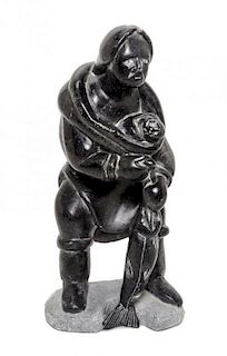 An Inuit Stone Sculpture Height 8 1/4 inches.