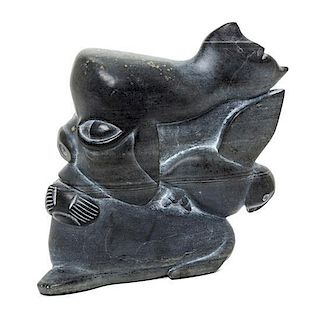 An Inuit Stone Sculpture Height 7 3/4 inches.