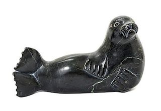 An Inuit Stone Sculpture Width 9 inches.