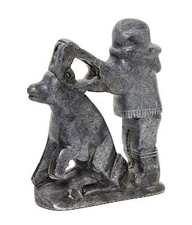 An Inuit Stone Sculpture Height 7 1/2 inches.