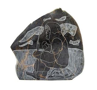 An Inuit Stone Plaque Width 7 inches.