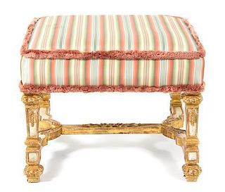 A Baroque Style Cream Painted and Parcel Gilt Tabouret, Height 19 x width 24 x depth 24 inches.