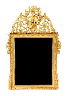 A Louis XV/XVI Giltwood Mirror, Height 54 x width 34 inches.