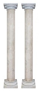 A Pair of Travertine Marble Columns, Height 102 x diameter 17 inches.