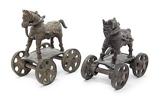 Pair of Antique Iron Horses on Wheels. Height 6 x width 5 inches.