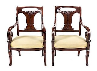 A Pair of Empire Style Mahogany Armchairs, Height 36 inches.