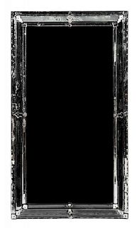 A Venetian Glass Mirror, Height 59 x width 33 inches.