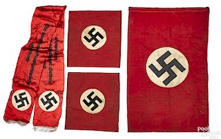 Three Nazi German flags and a funeral sash