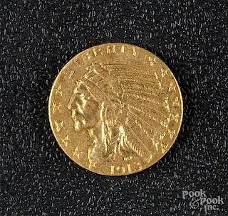 US 1913 five dollar Indian head gold coin.
