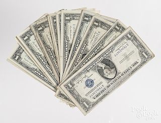 Nineteen US 1957 one dollar bills