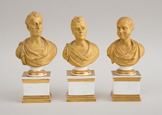 SET OF THREE SAMUEL ALCOCK AND CO. IMPROVED PORCELAIN GILDED BUSTS OF VICTORIAN STATESMEN