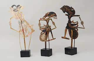 THREE BALINESE SHADOW PUPPETS, ON STANDS