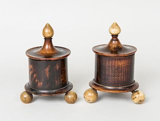 PAIR OF TURNED FRUITWOOD JARS AND COVERS WITH ALABASTER FEET AND FINIAL
