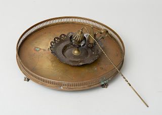 CIRCULAR BRASS TRAY ON FOUR FEET, A CHAMBER STICK HOLDER, AND A SNUFFER