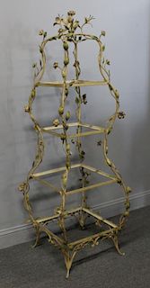 Patinated Metal Etagere with Floral Decoration.