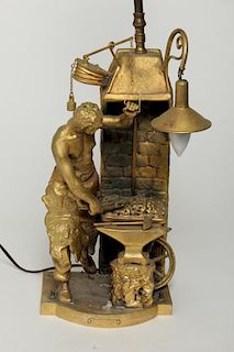 After Rousseau French Gilt Metal "Blacksmith" Lamp