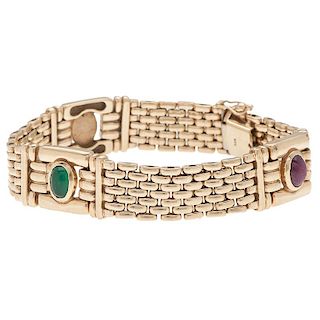 Panther Link Bracelet in 14 Karat Yellow Gold with Ruby, Sapphire and Emerald